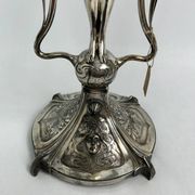Large figurative chandelier with a femme fatale nymph.