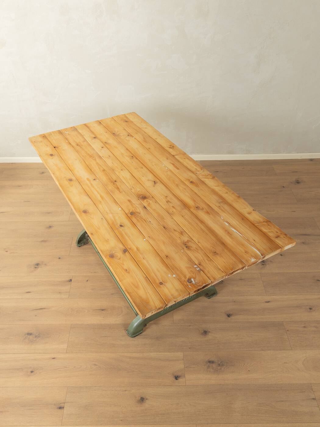 Unique dining table with cast iron base and solid wood top