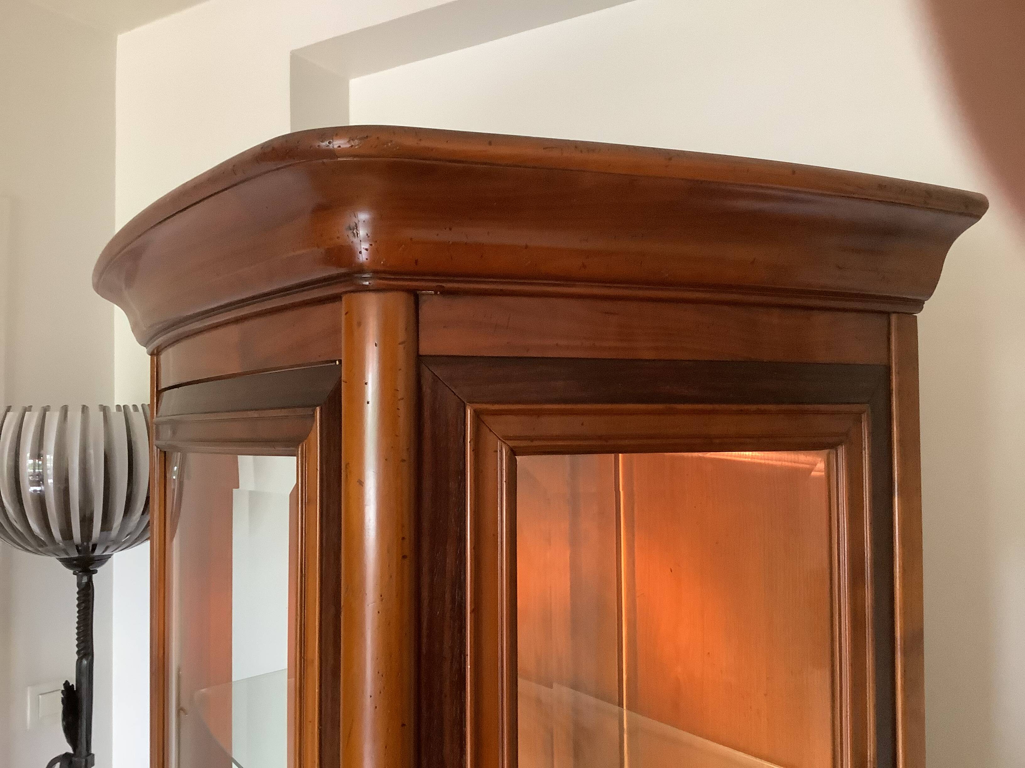 Cherry display cabinet by Christian Robert.