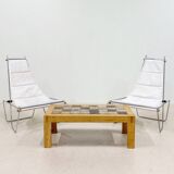 A pair of low chairs. France 70s