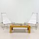 A pair of low chairs. France 70s
