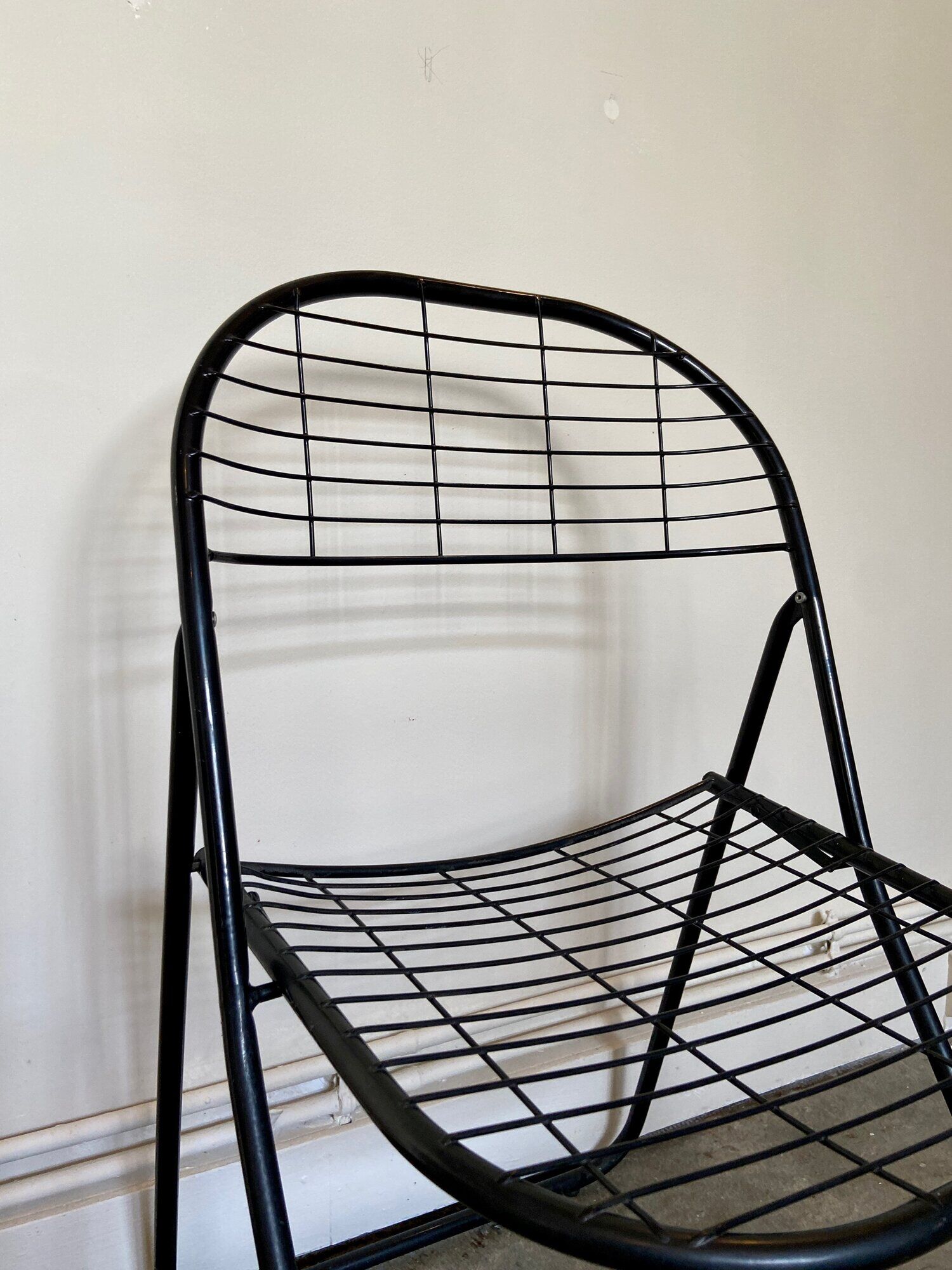 Black metal folding chair