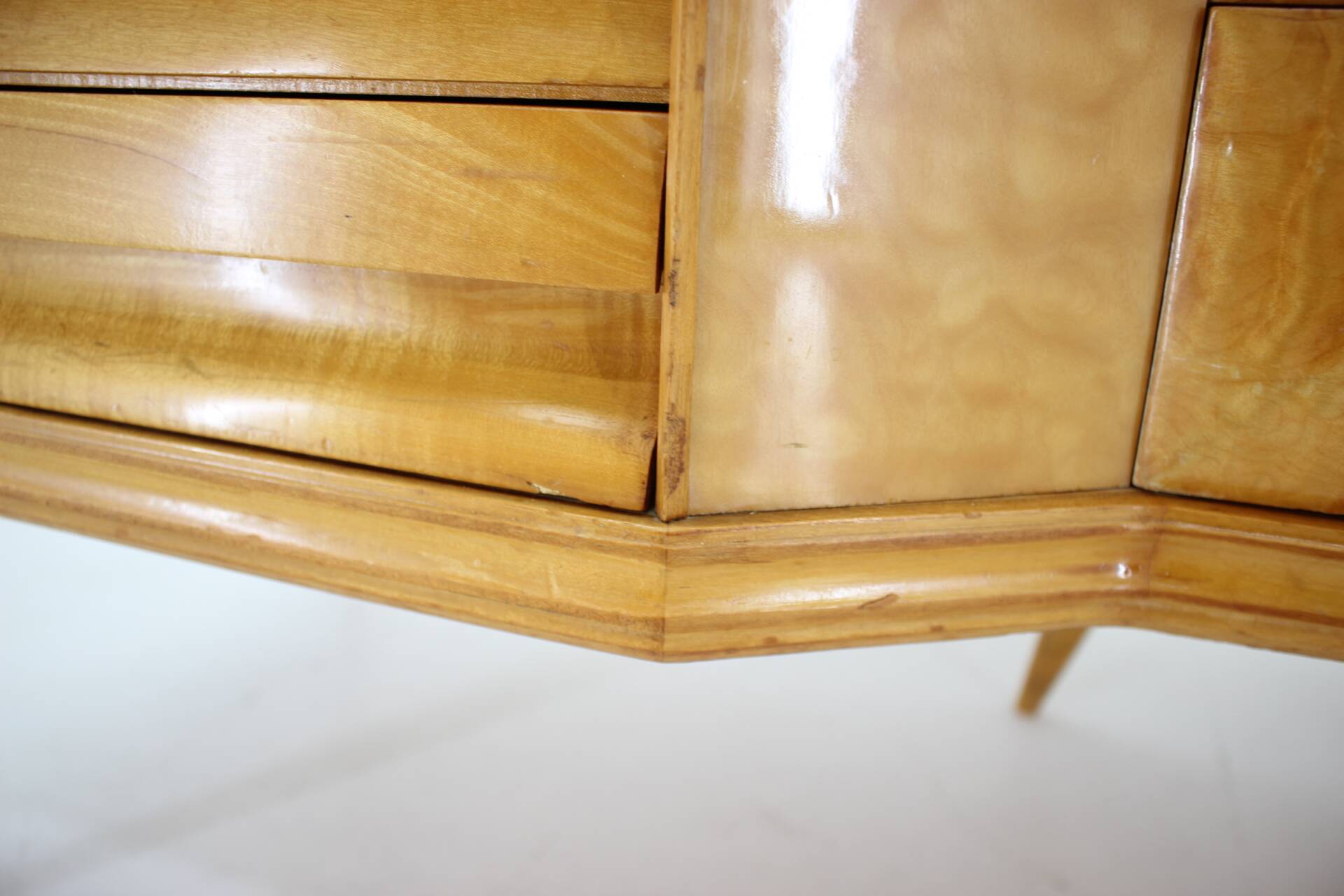 1960s italian sideboard/chest of drawers in high gloss finish with glass top and shelf