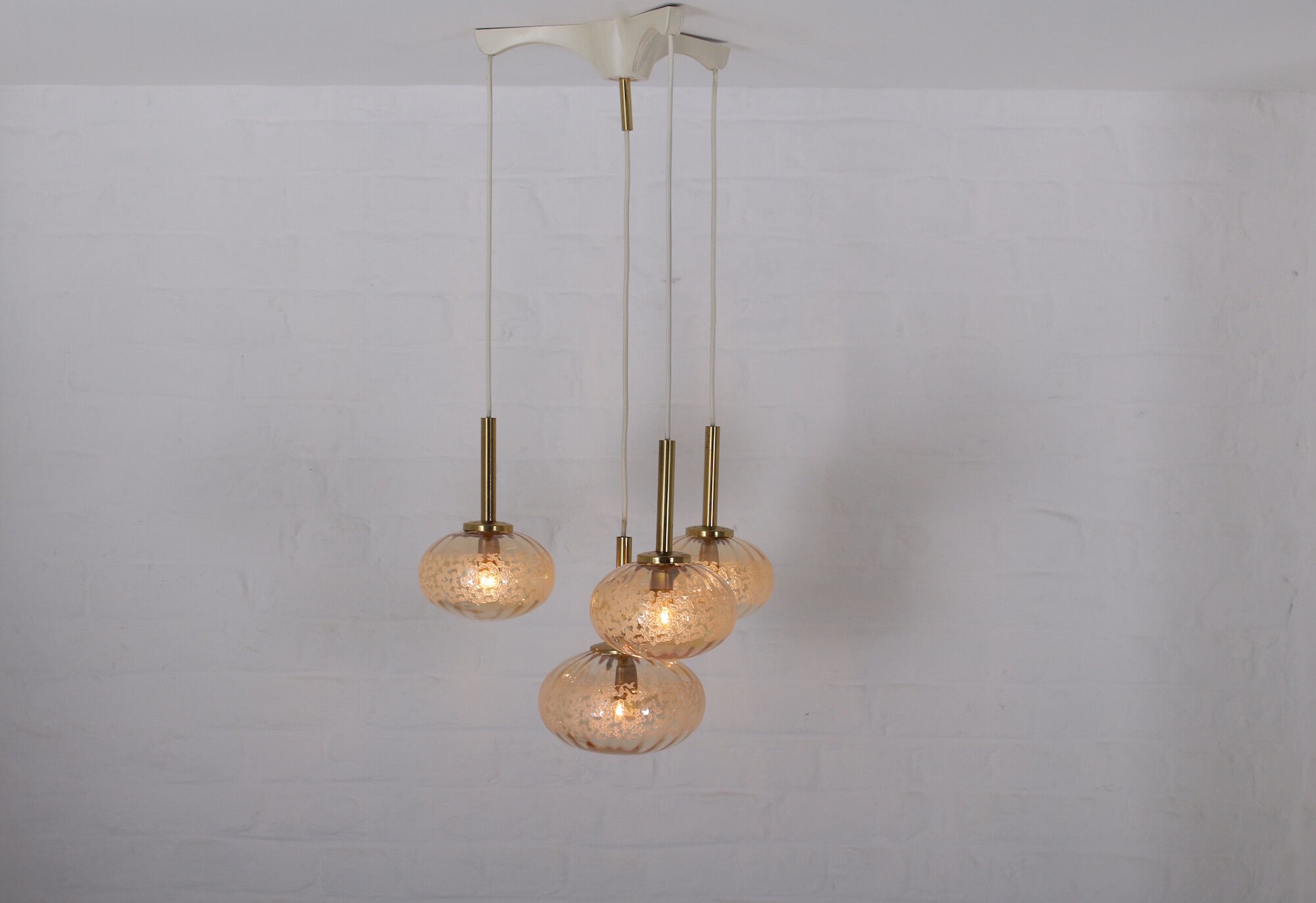 Cascade chandelier 4 globe in blown amber glass