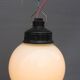 Trio suspensions globes verre opalin et bakélite