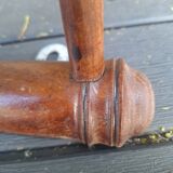 Old wooden coat hook imitating bamboo.