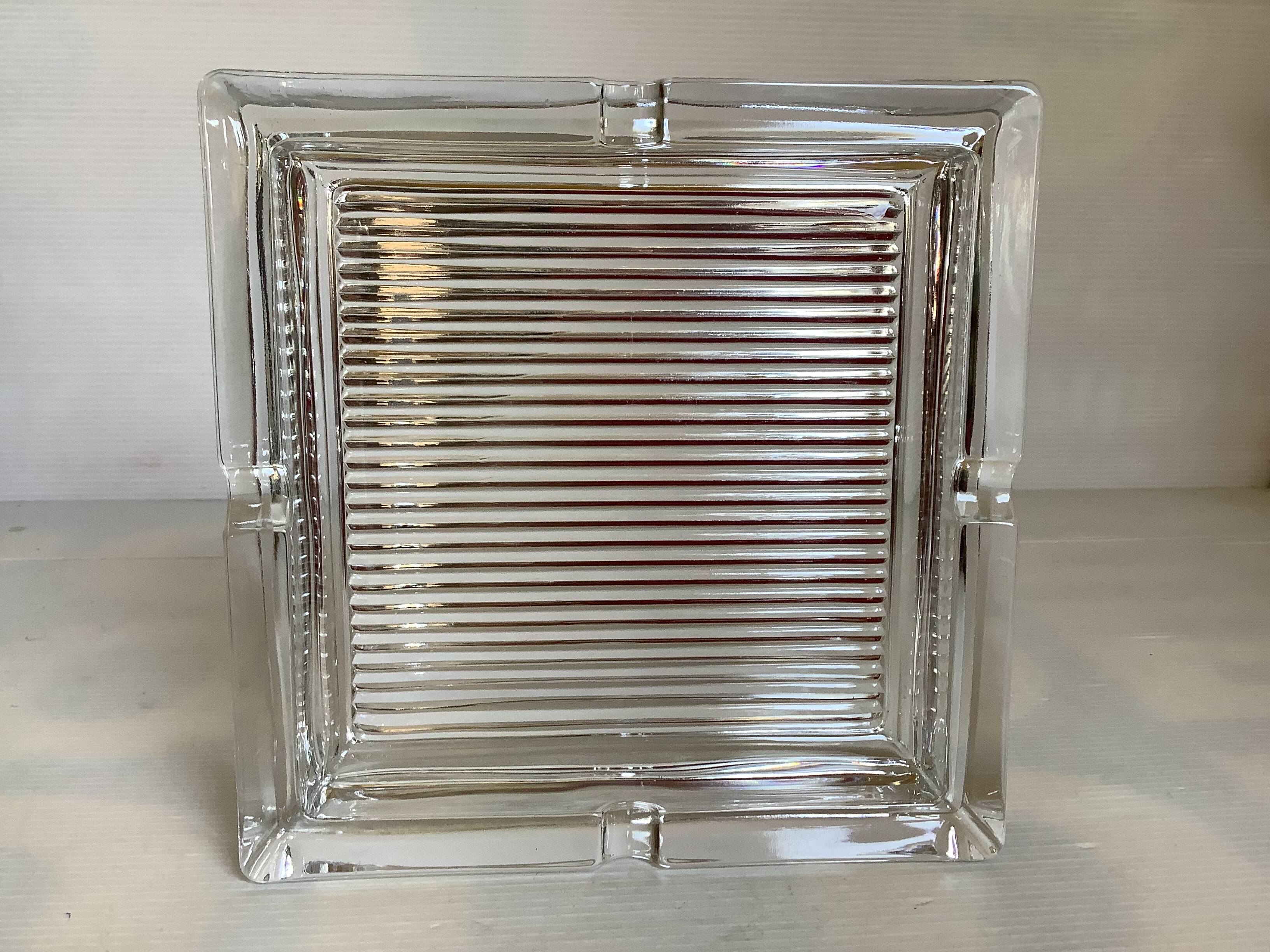 Large crystal ashtray and pocket tray.