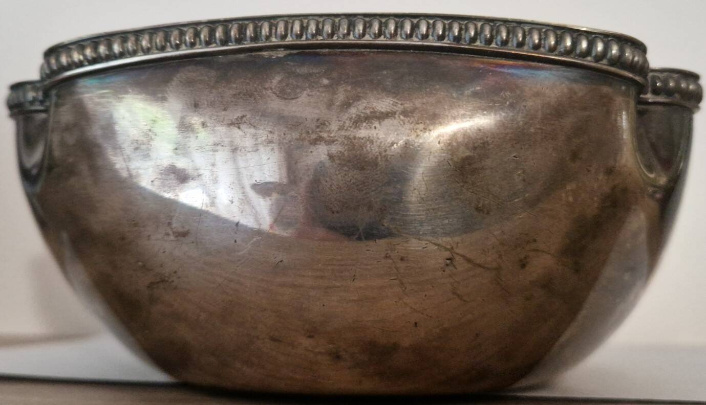 I037 Large shallow antique silver-plated dish in the Louis XVI style with bead decoration.
