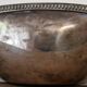 I037 Large shallow antique silver-plated dish in the Louis XVI style with bead decoration.