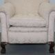 Victorian suite in damask, walnut frame, legs carved in lion's paw.