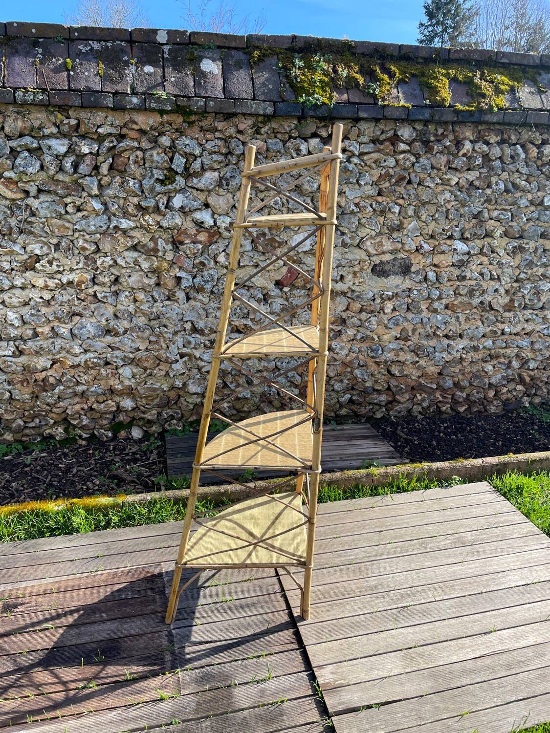 Audoux Minnet style corner shelf in vintage rattan 1950