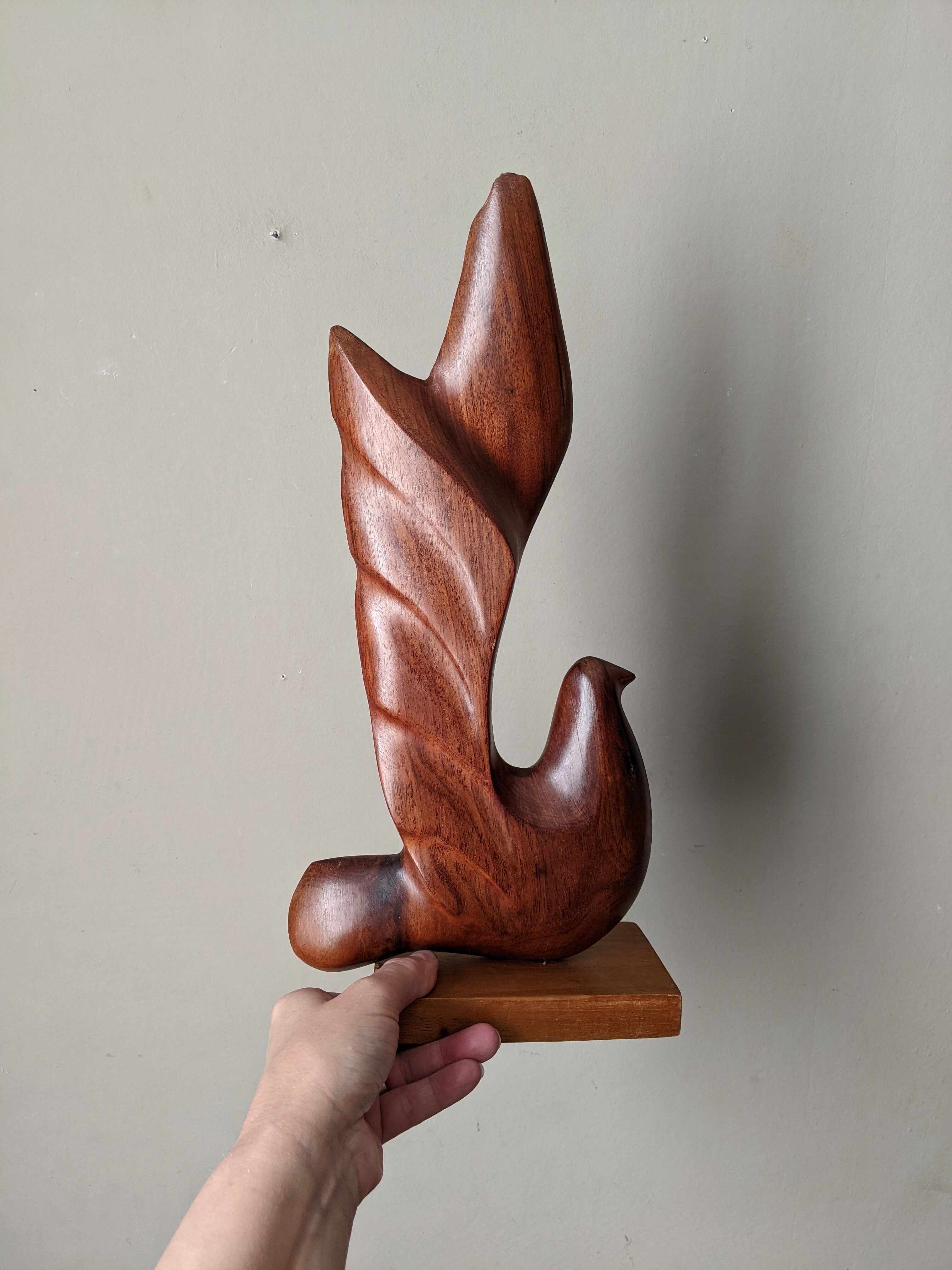 Handcrafted teak wood dove sculpture from the 1960s.