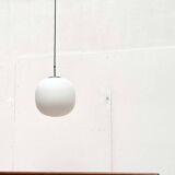 Minimalist suspended glass ball lamp from the vintage German space age by Glashütte Limburg, 1970s.