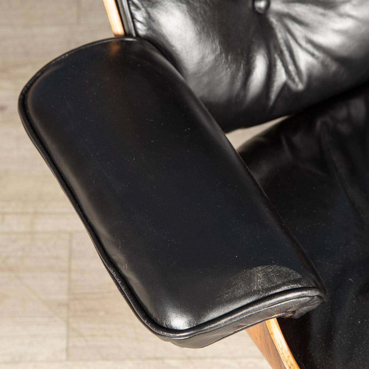 Eames lounge chair in black leather, around 1980