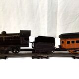 Small JEP mechanical train, including locomotive, tender, sleeping car, rail, 1930s