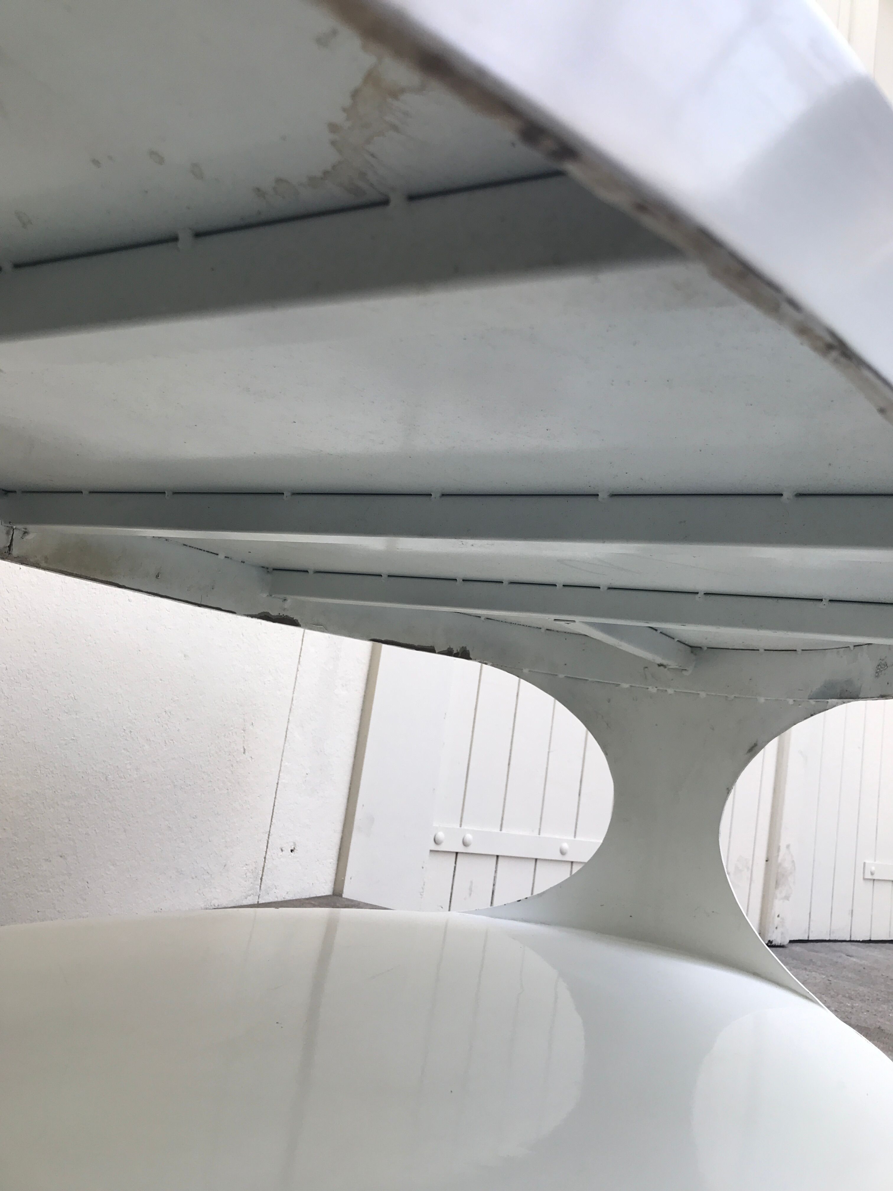 Oval white-panelled metal coffee table 70s