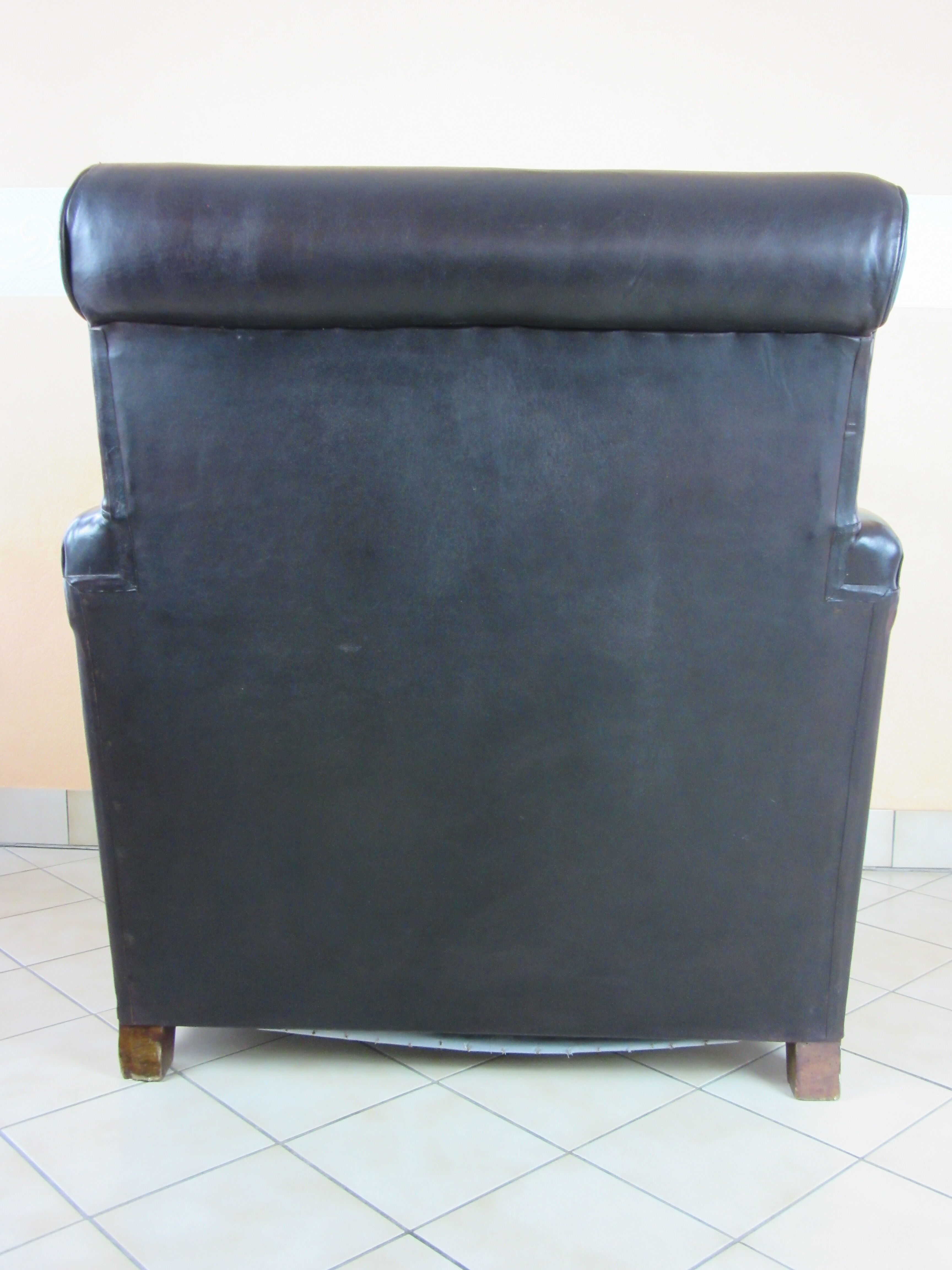 Fauteuil dandy ancien en cuir