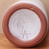 Vase by Antonio Lampecco minimalist white ceramic scroll