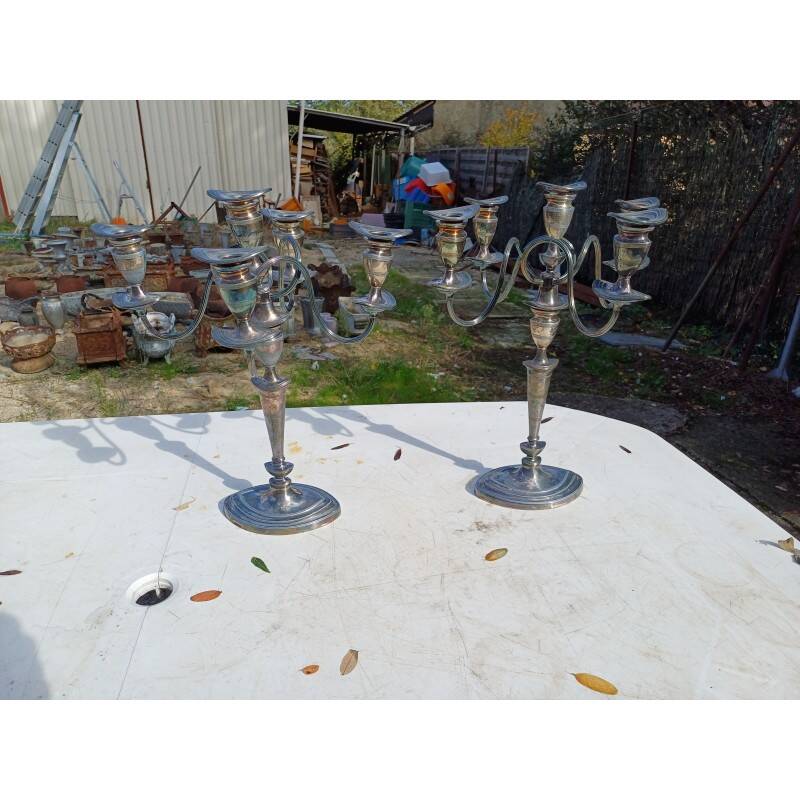 Pair of silver-plated metal candlesticks