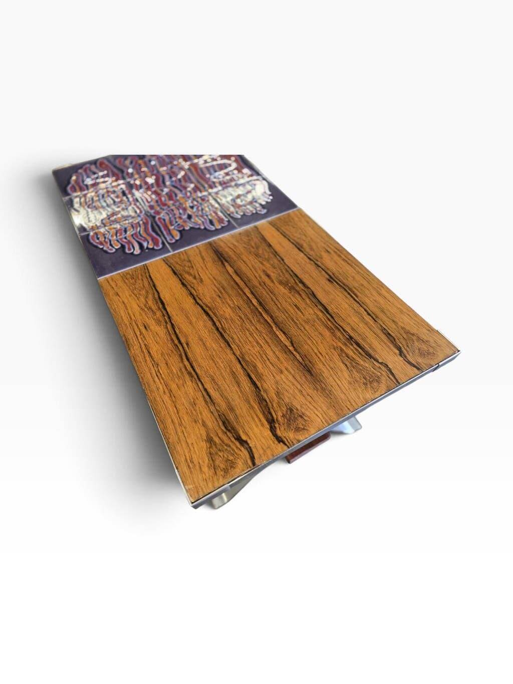 Vintage chrome coffee table with ceramic accent.