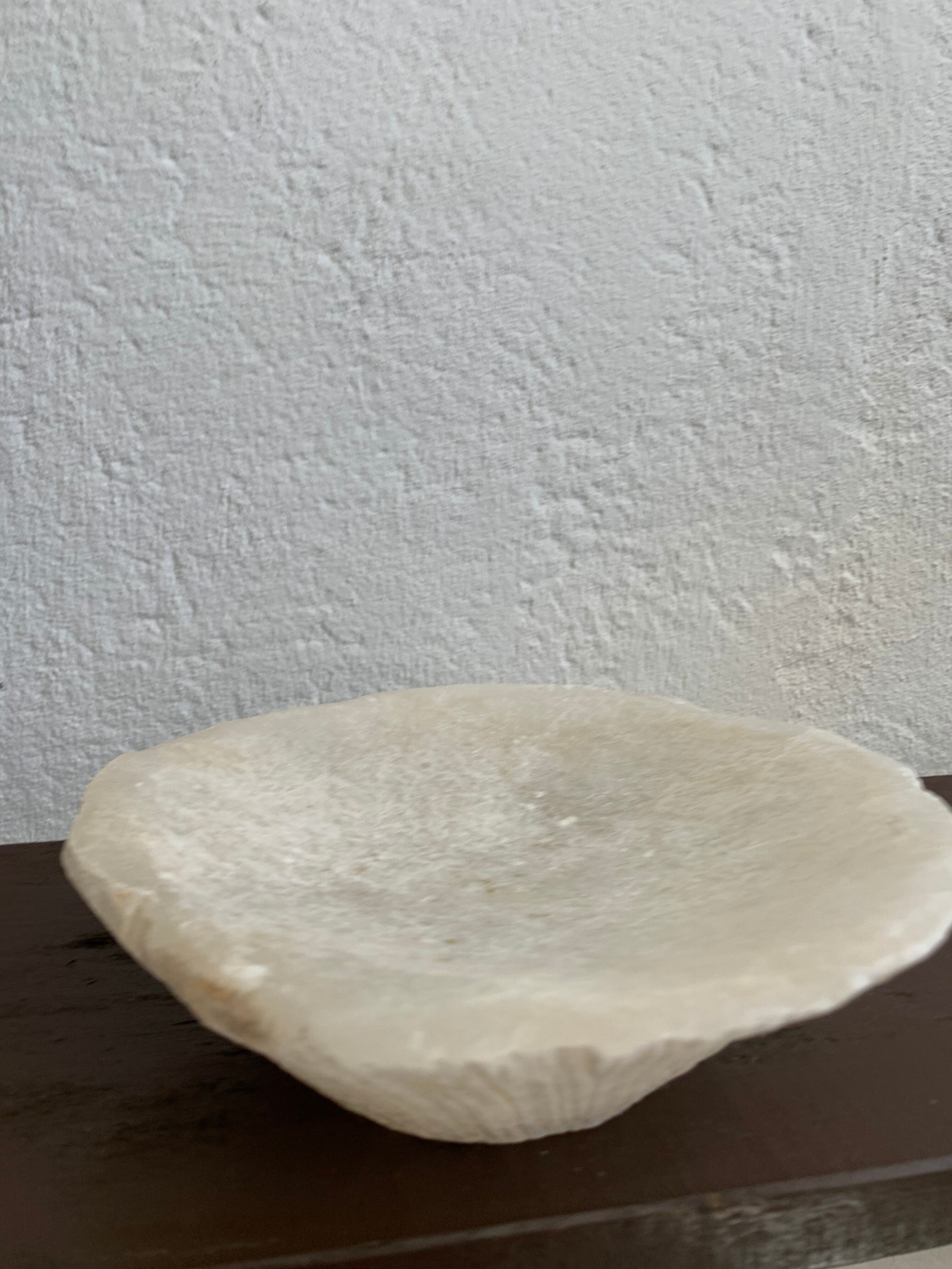 Empty pocket in vintage alabaster