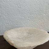 Empty pocket in vintage alabaster