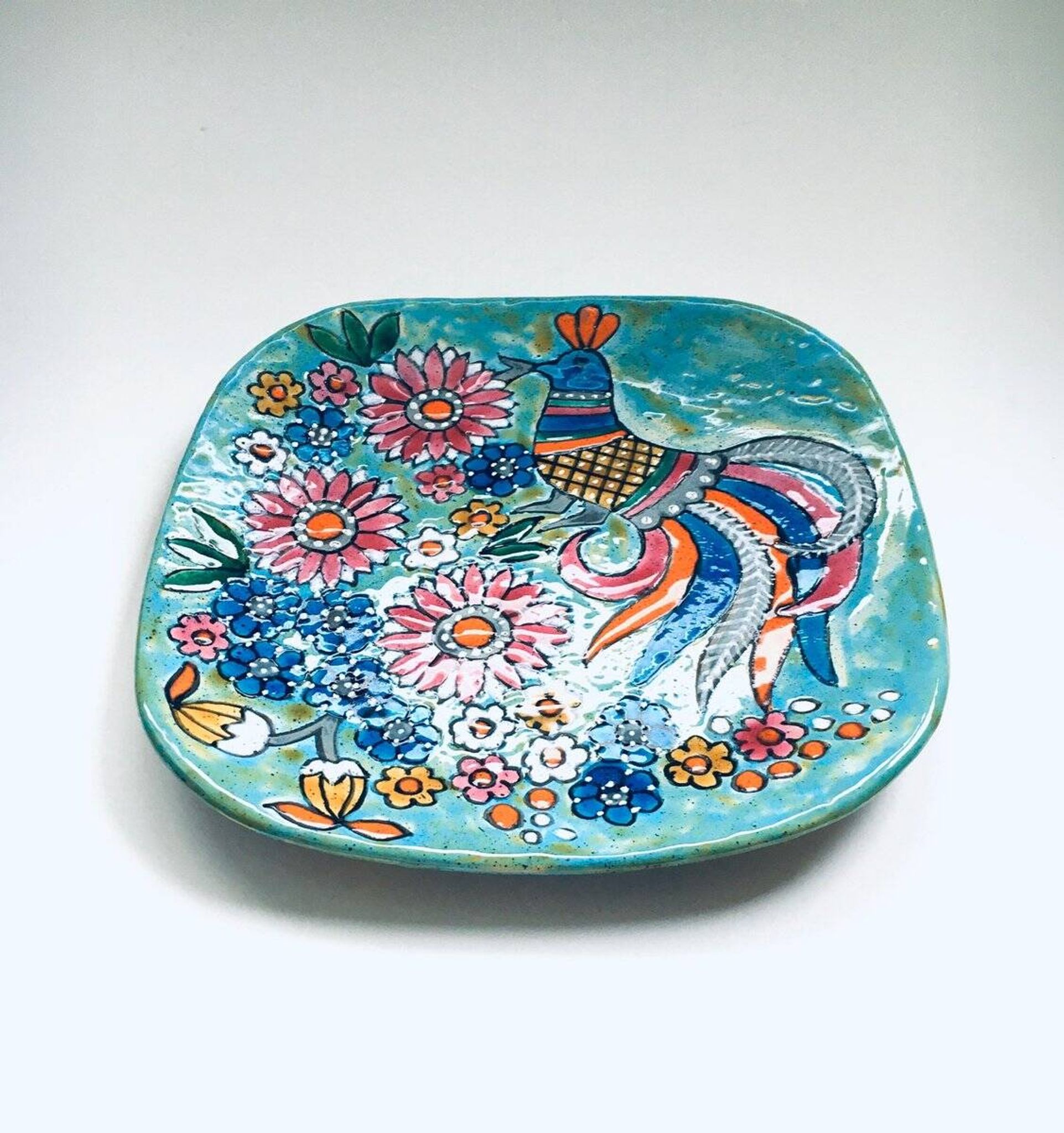 French hand-painted art pottery charger dish by Marjatta Taburet, Quimper, 1960s.