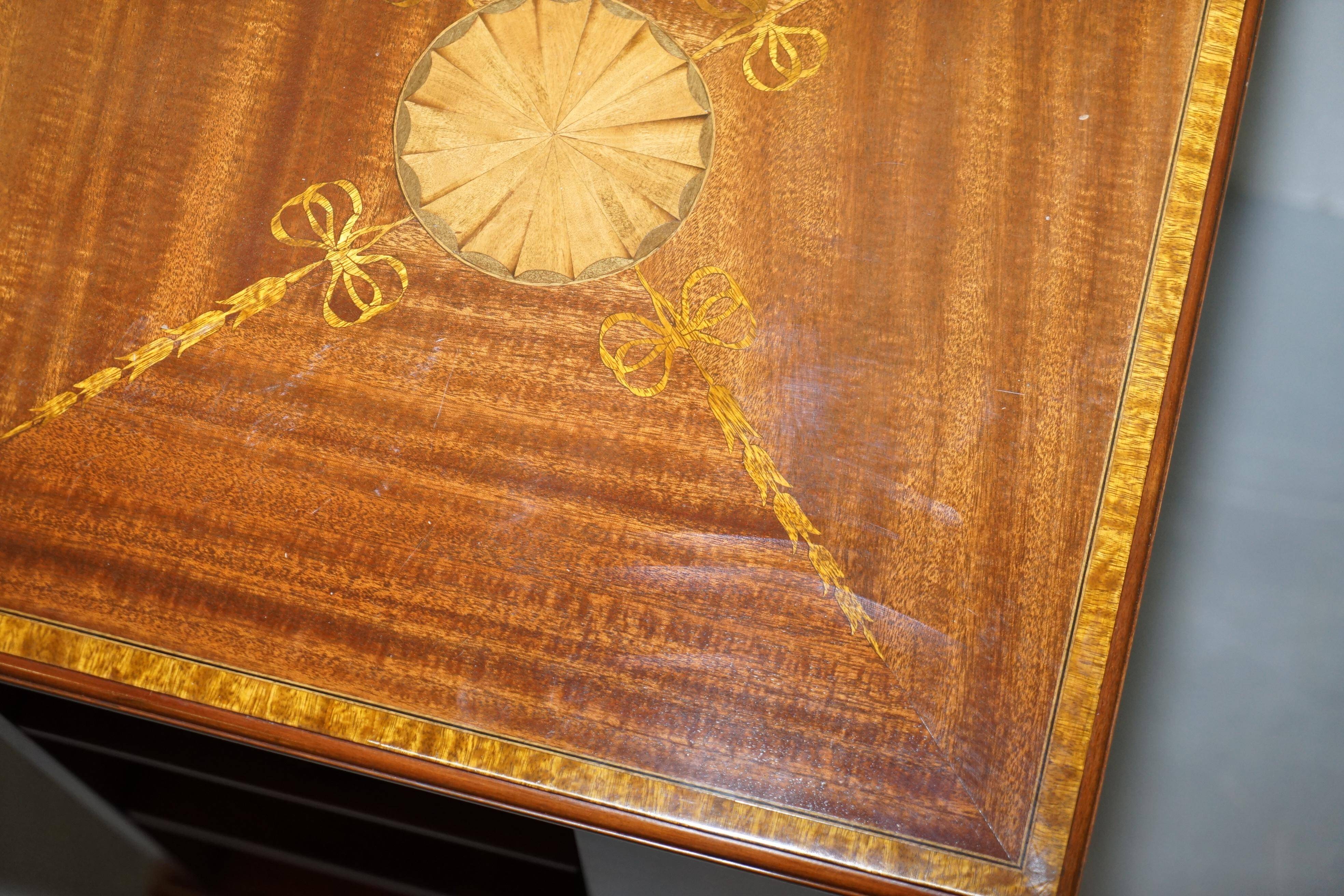 Edwardian burr walnut revolving bookcase with Sheraton inlays circa 1900