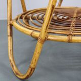 1960s Italian rattan coffee table with glass top, mid-century round design