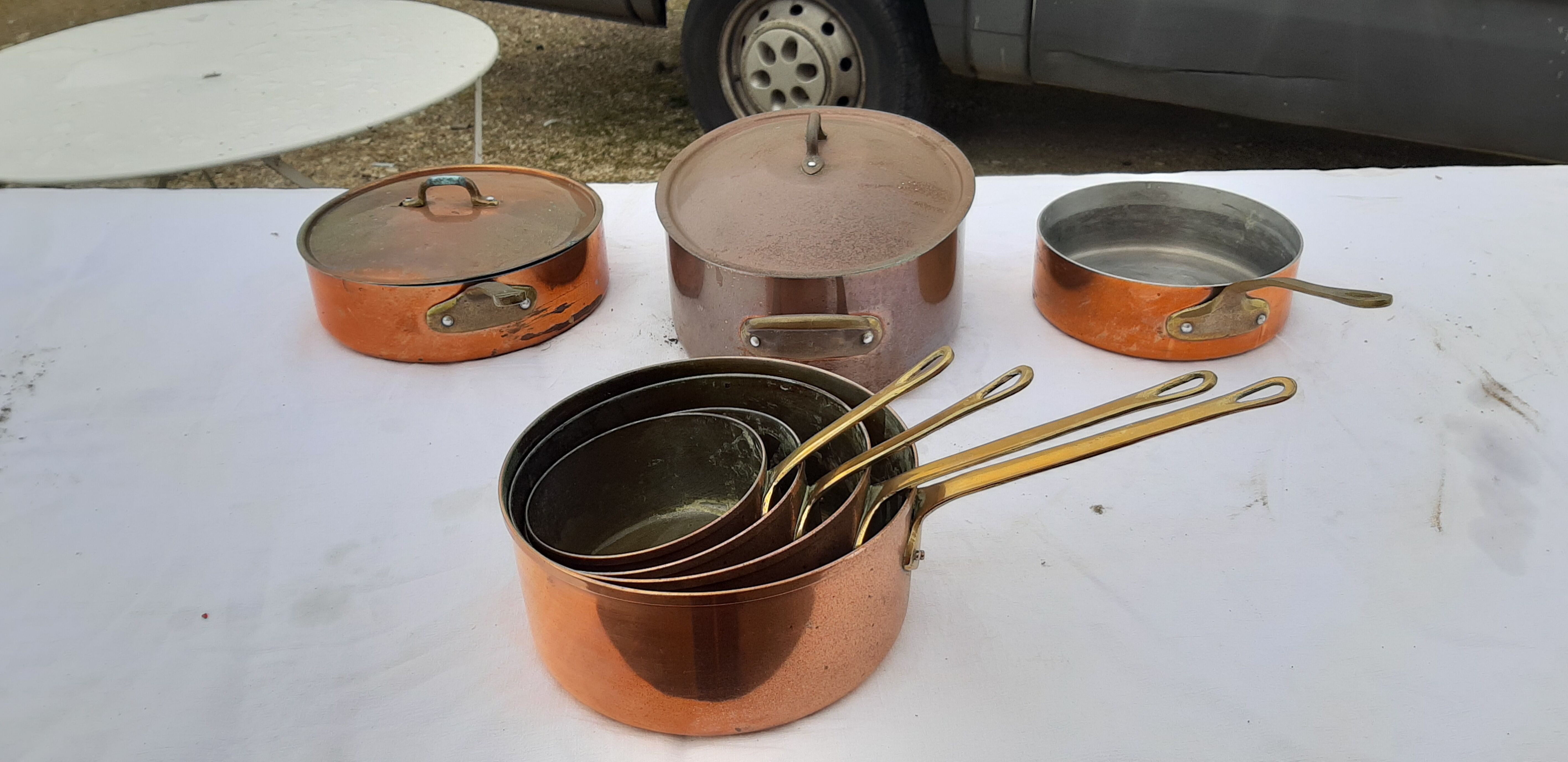 Lots of tinned copper kitchen utensils