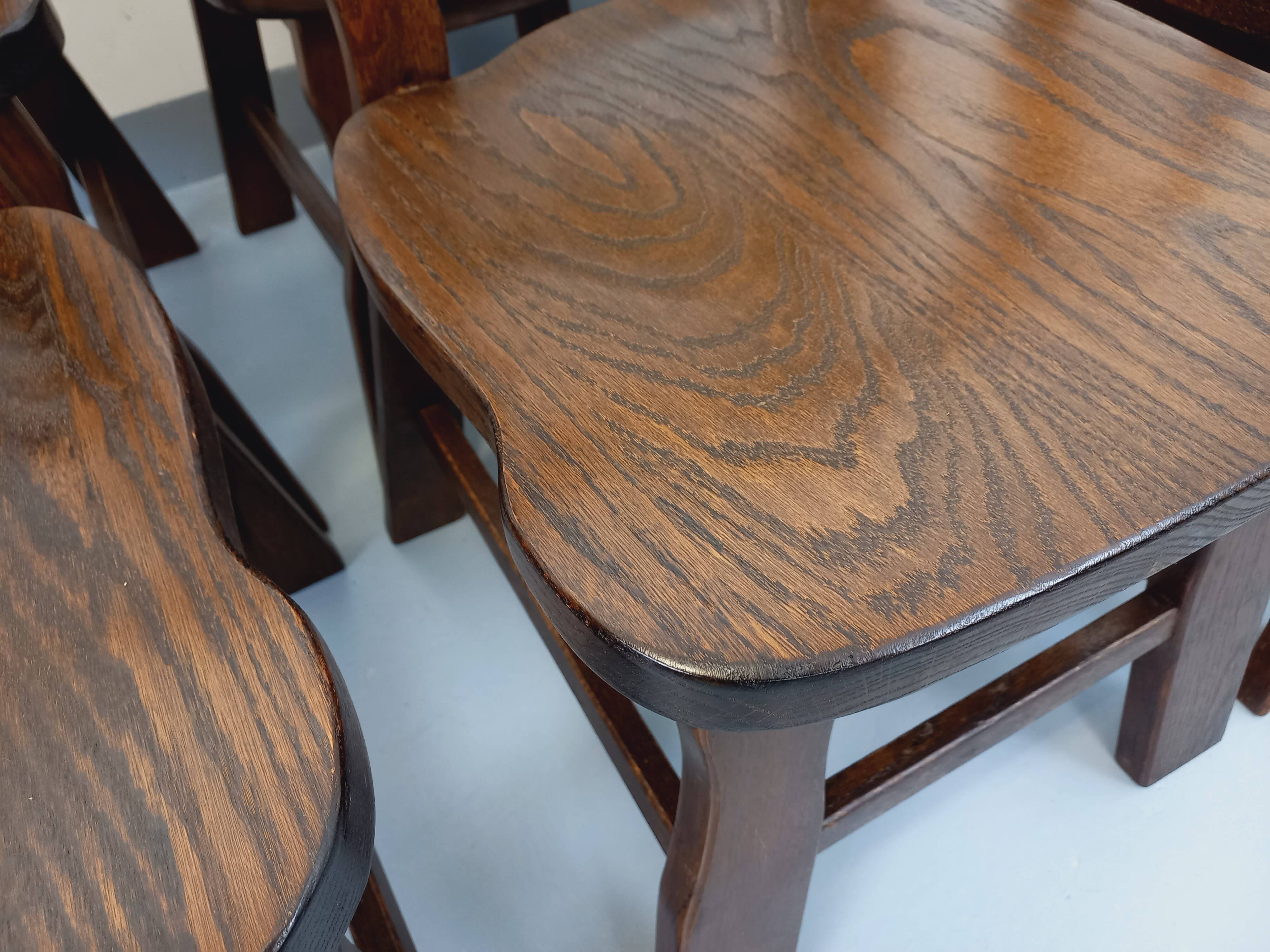 Set of 6 vintage brutalist oak chairs from the 1950s.