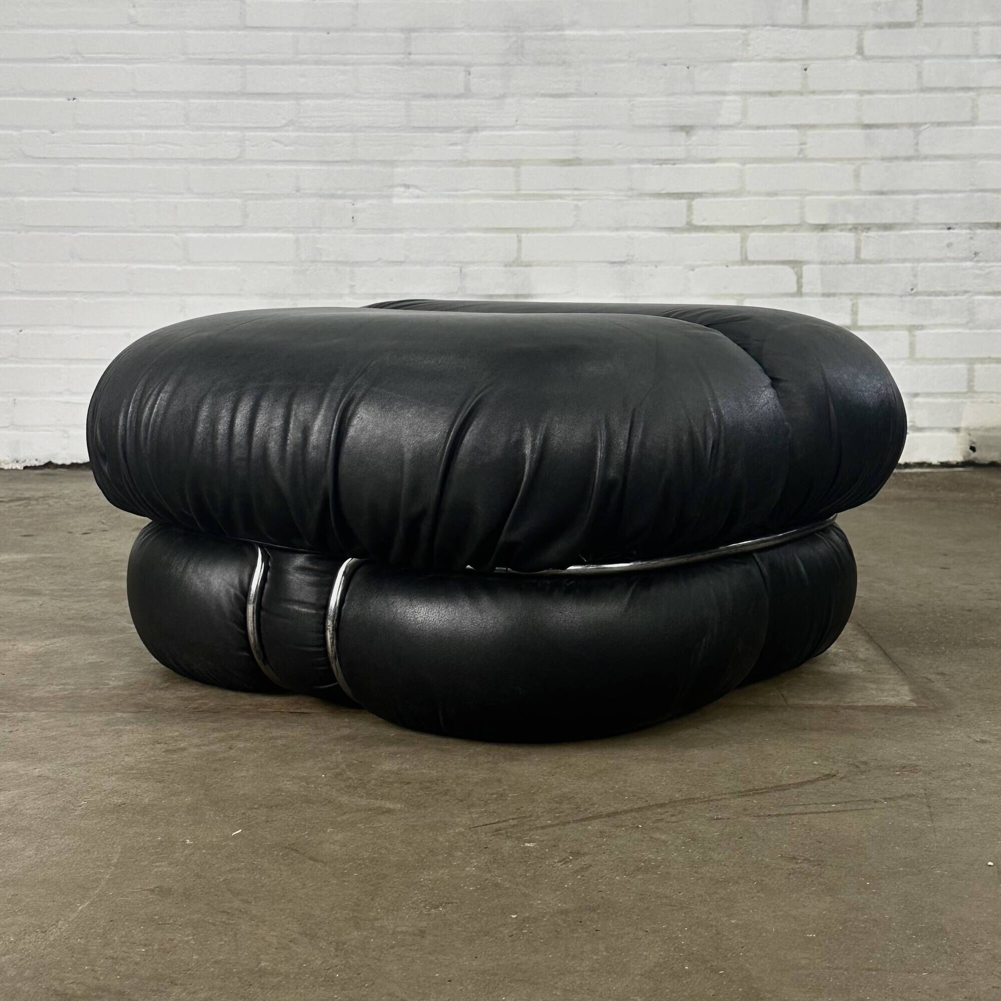 Okay armchair by Adriano Piazzesi in black leather with ottoman