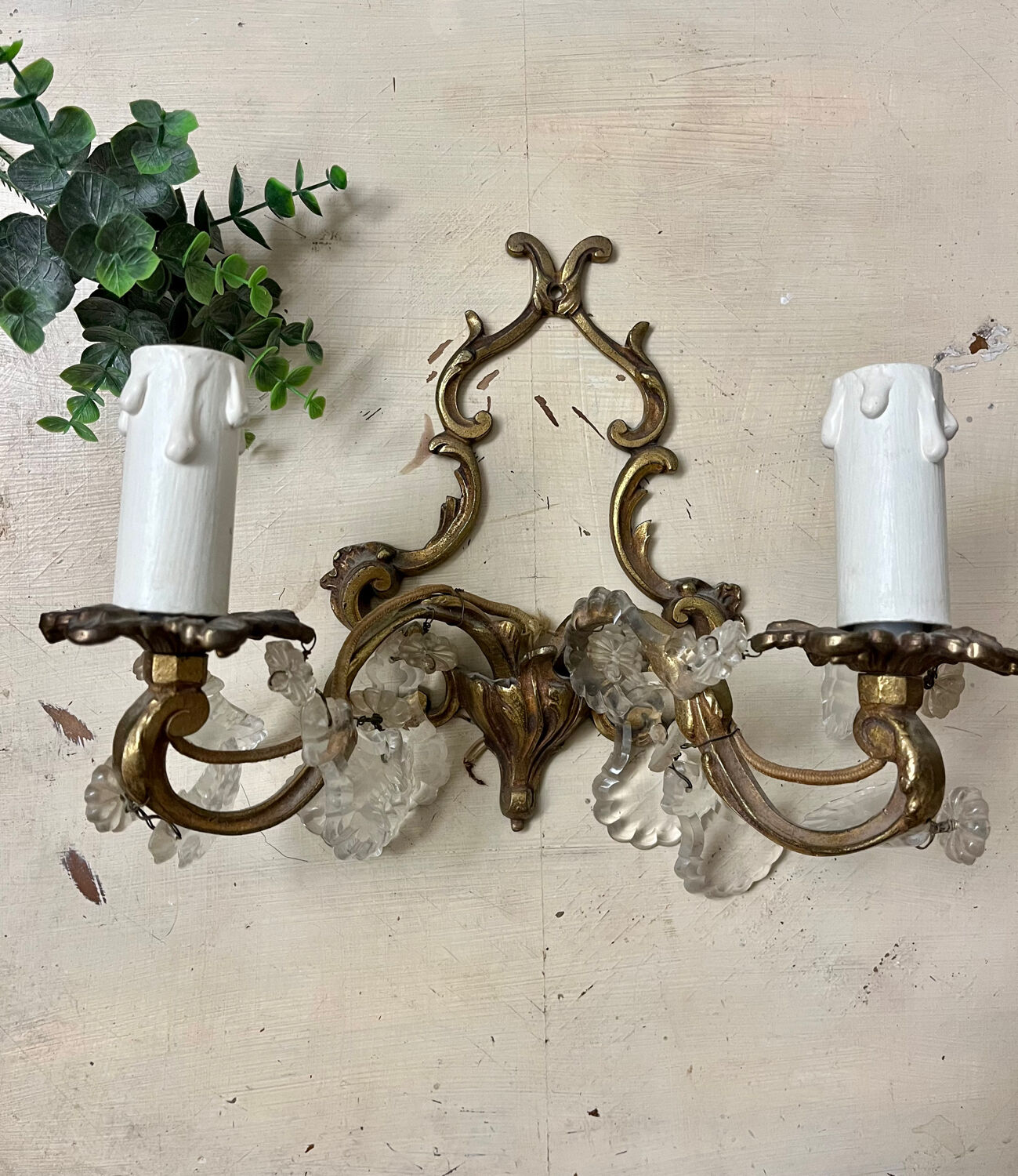 Louis XV style two-light bronze wall light with antique tassels