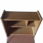 Vintage 1960s secretary desk with an angled design, light wood, and tapered legs.