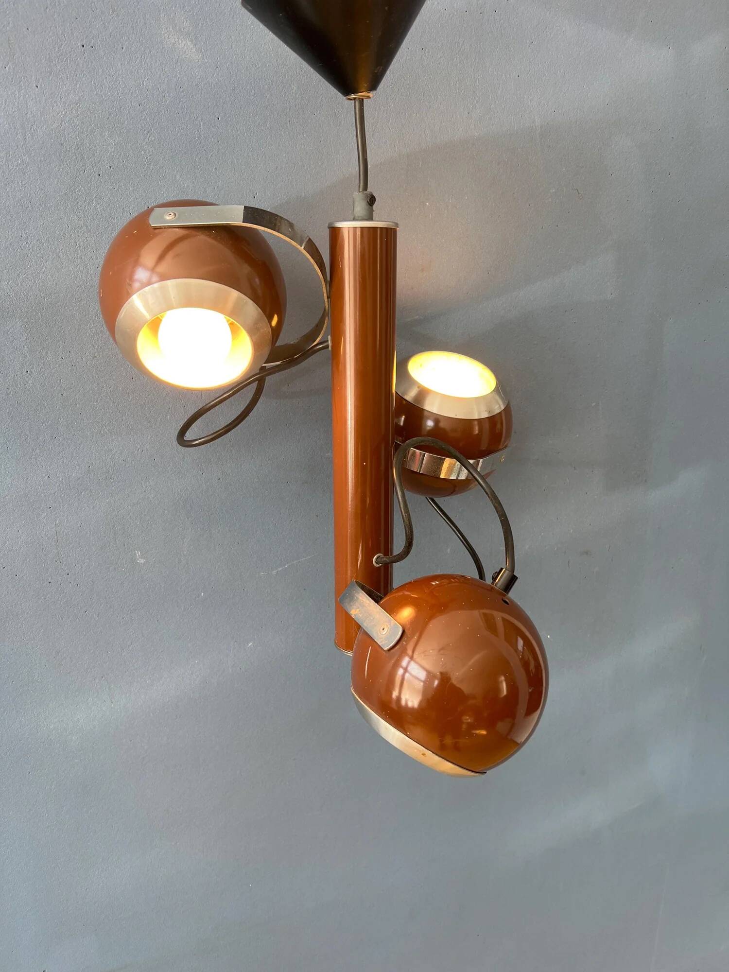 Brown vintage space age pendant lamp with three eyeball shades