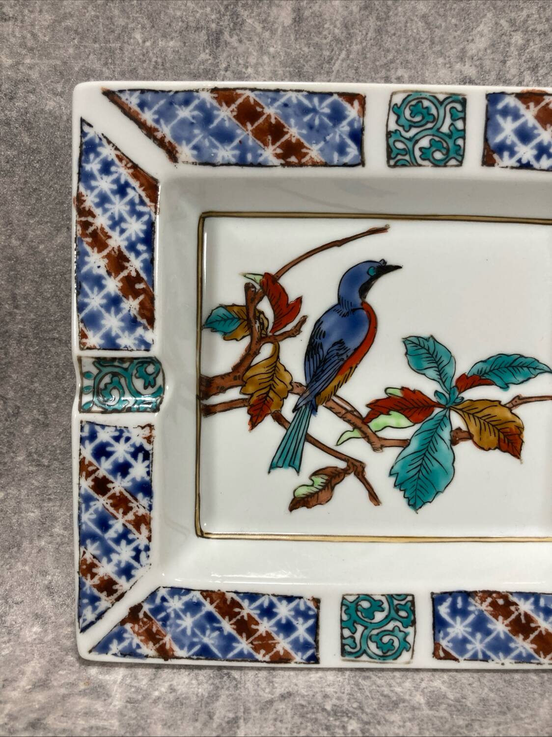 Ashtray. Trinket dish. Japanese porcelain. Blue bird on an autumn branch
