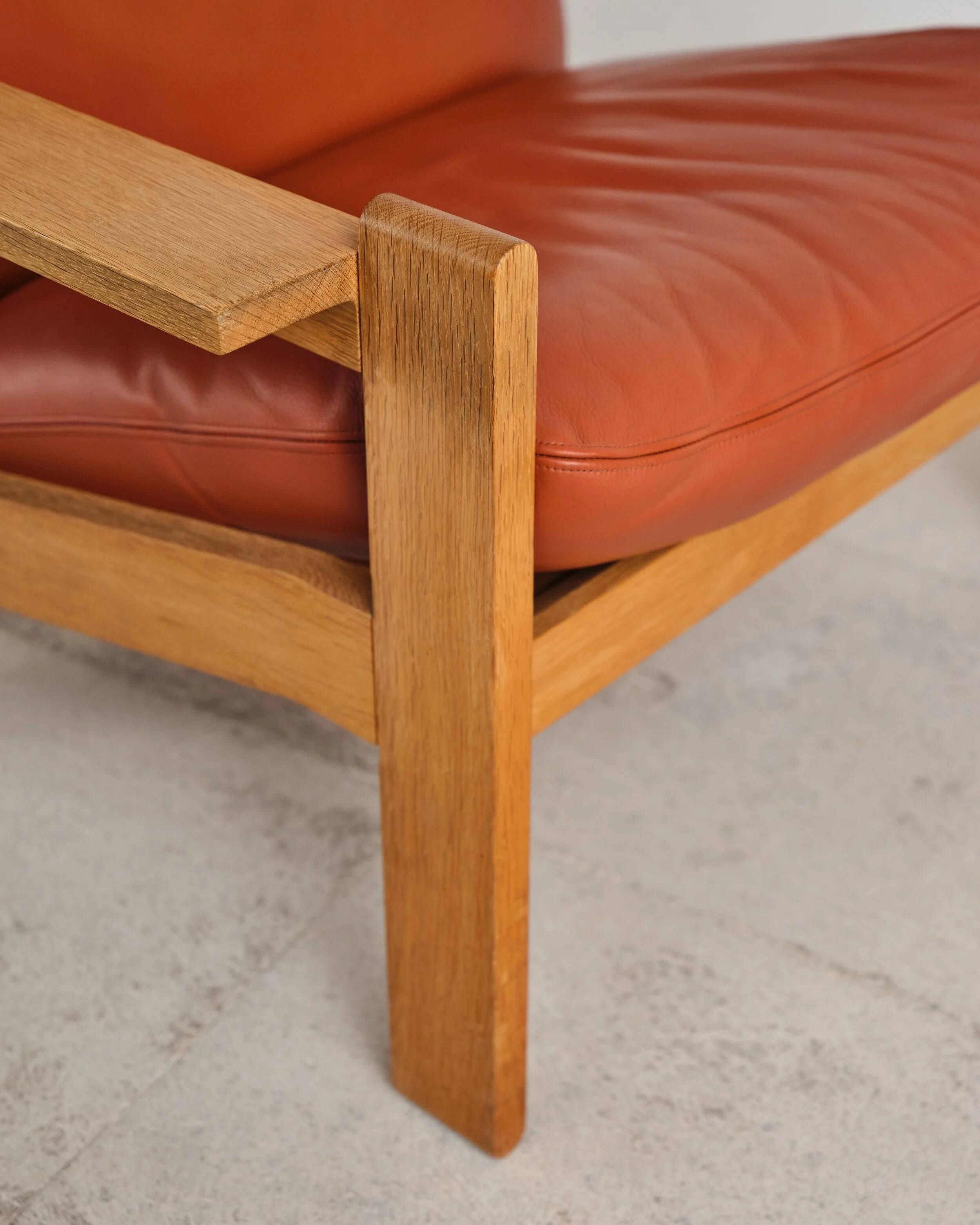 Brutalist oak and leather sofa, Tage Poulsen, 4 pieces, Denmark, 1970s.
