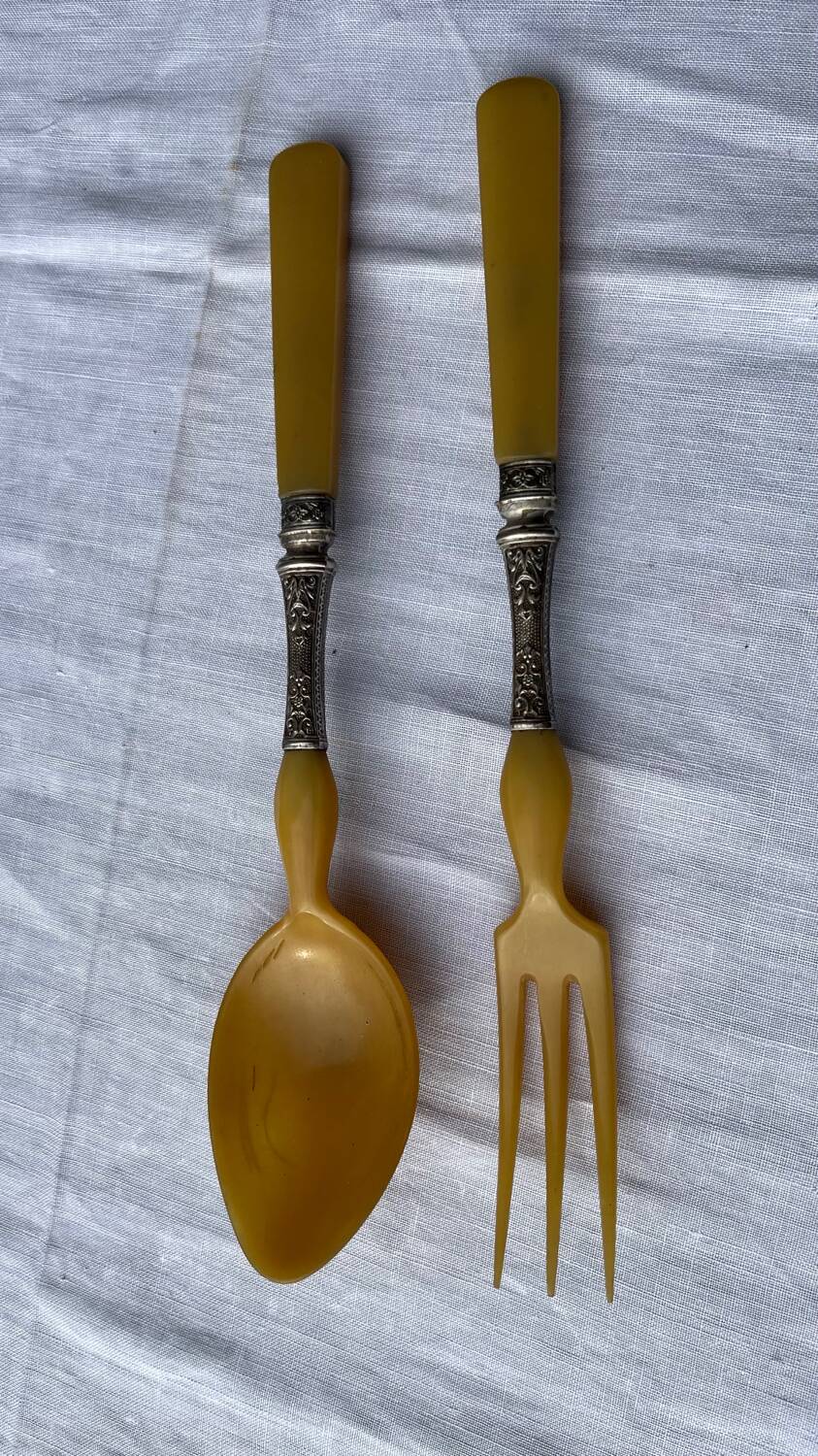 Old salad service in horn and silver metal