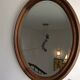Antique oval beveled mirror
