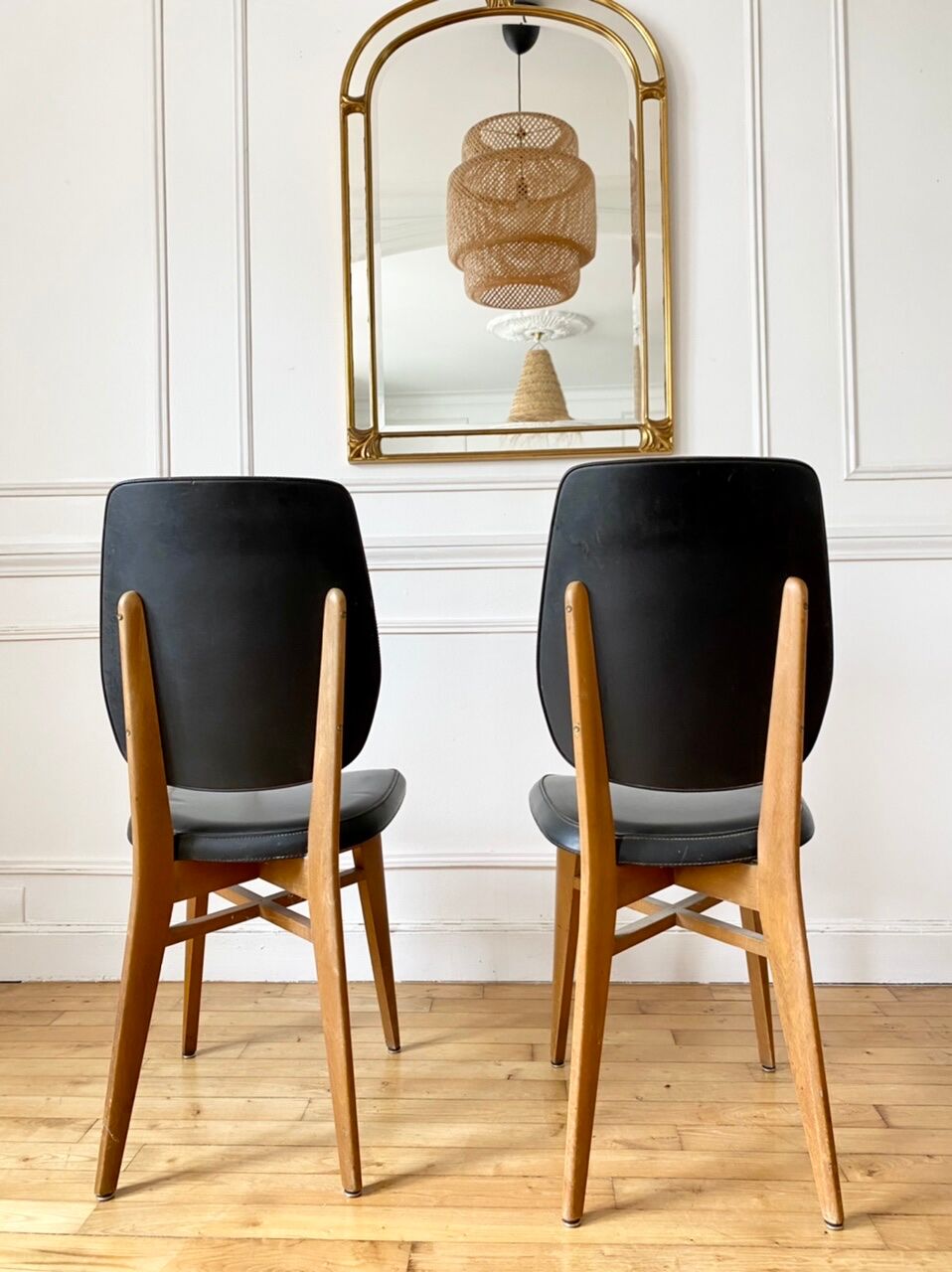 Pair of vintage wood and leather chairs