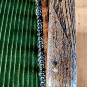 1900s Arts and Crafts style tapered wingback armchair