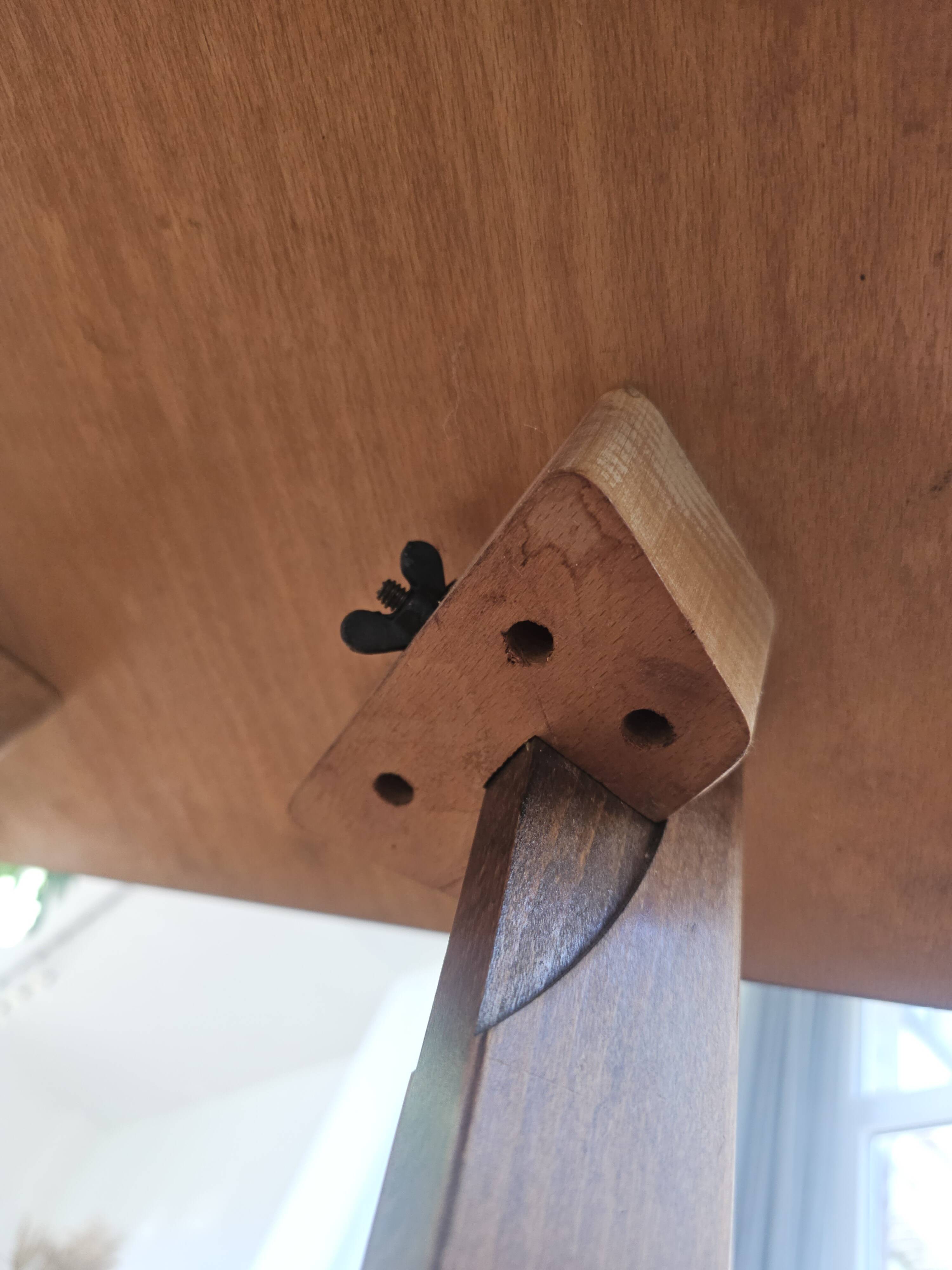 Vintage side table with double top in Scandinavian style.