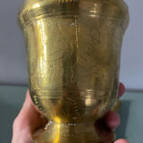 Golden metal mortar and pestle