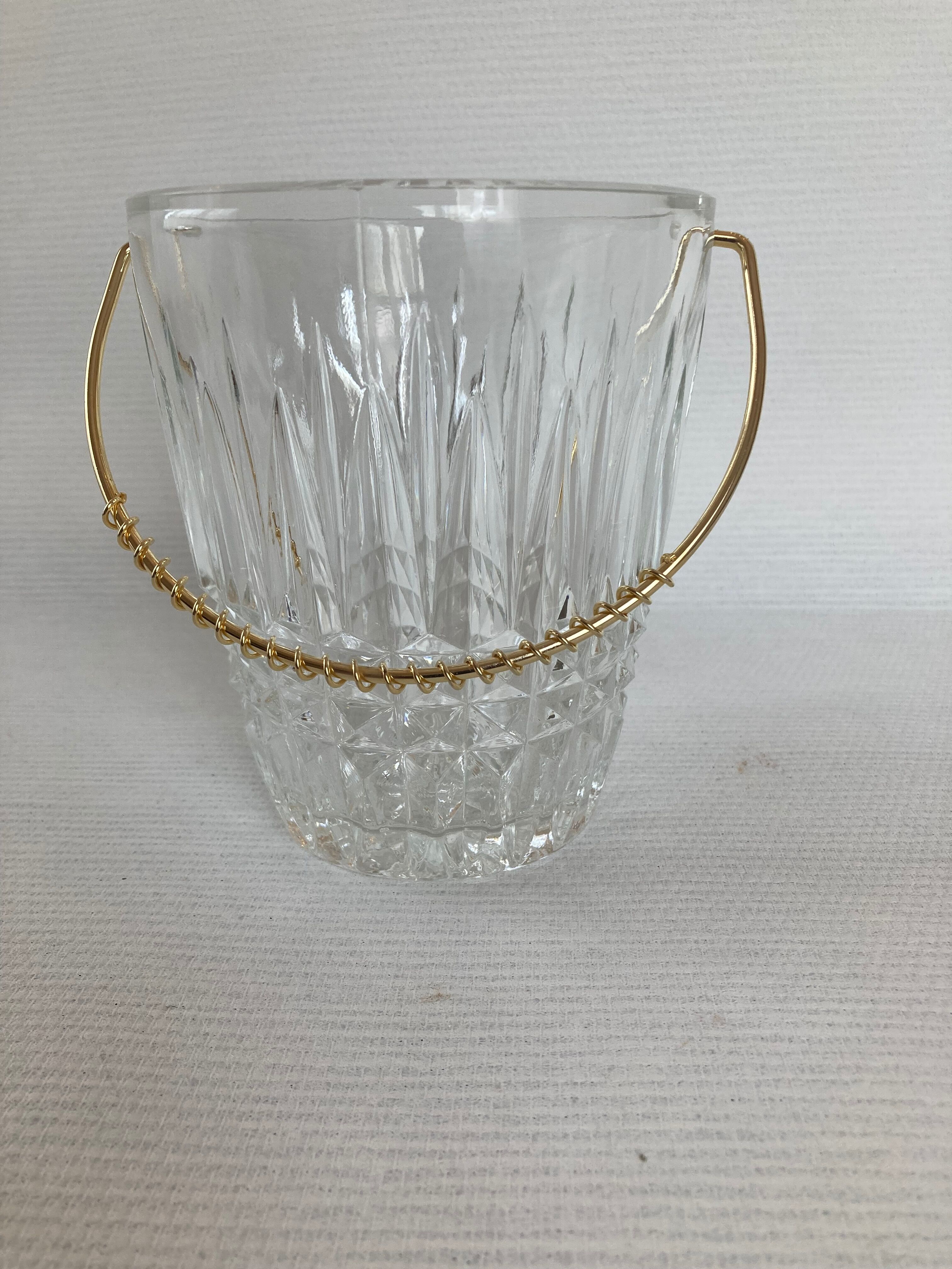 Glass ice bucket and spoon
