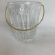 Glass ice bucket and spoon