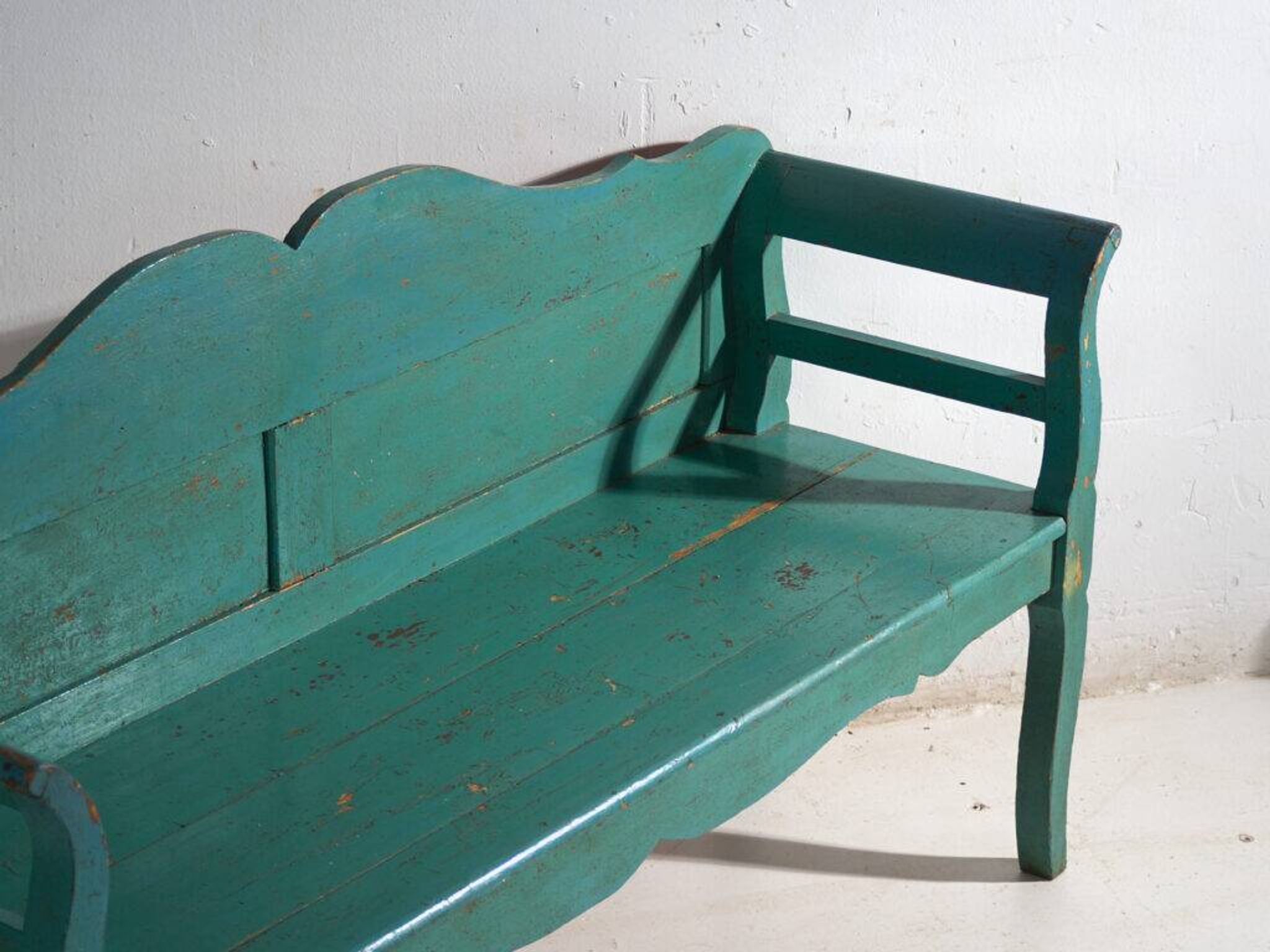 Old bench painted green in pine wood – Central Europe, around 1910