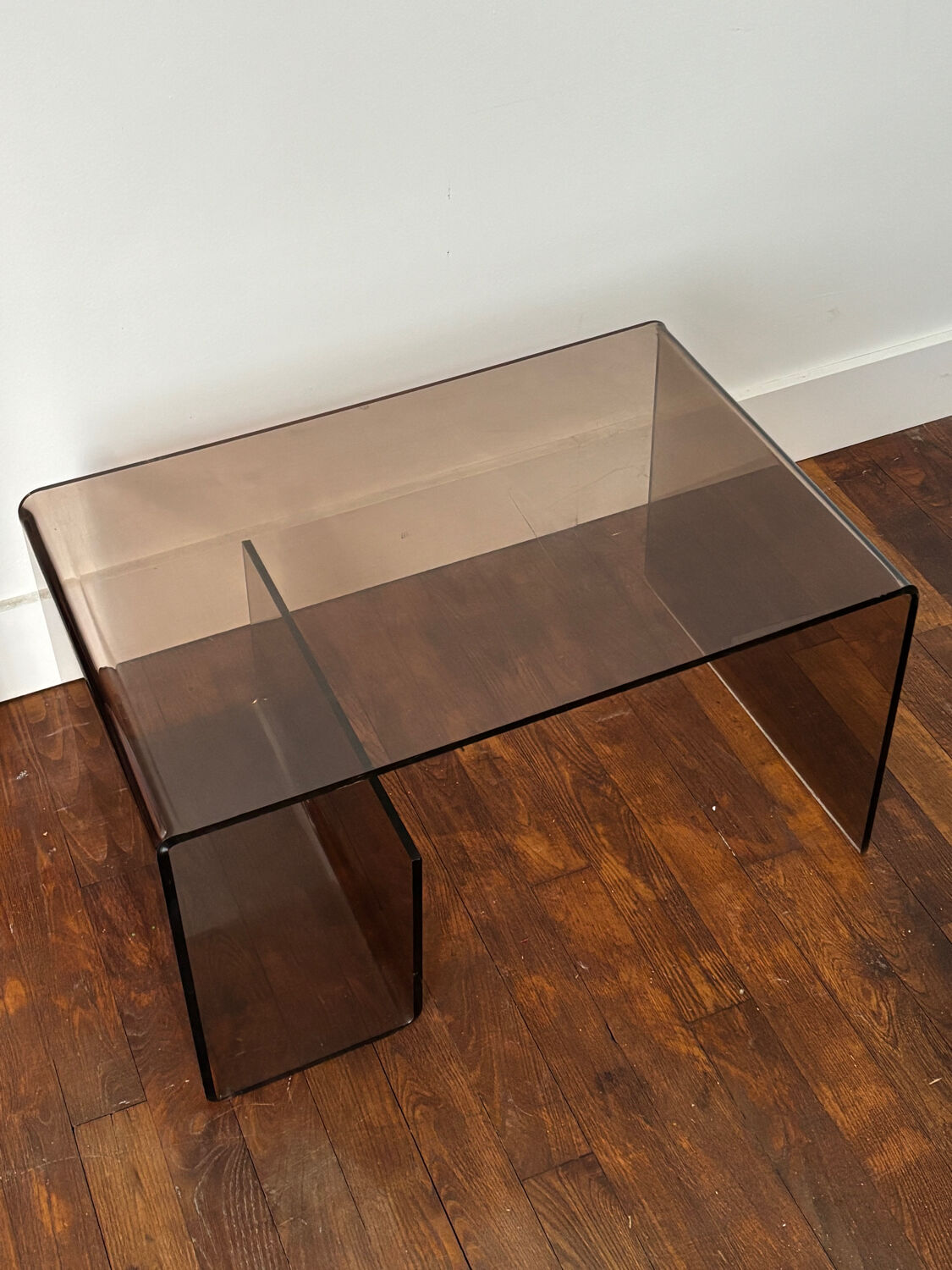 Smoked plexiglass coffee table
