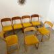 Set of 7 Baumann sled chairs in wood and mustard yellow fabric, 1960s