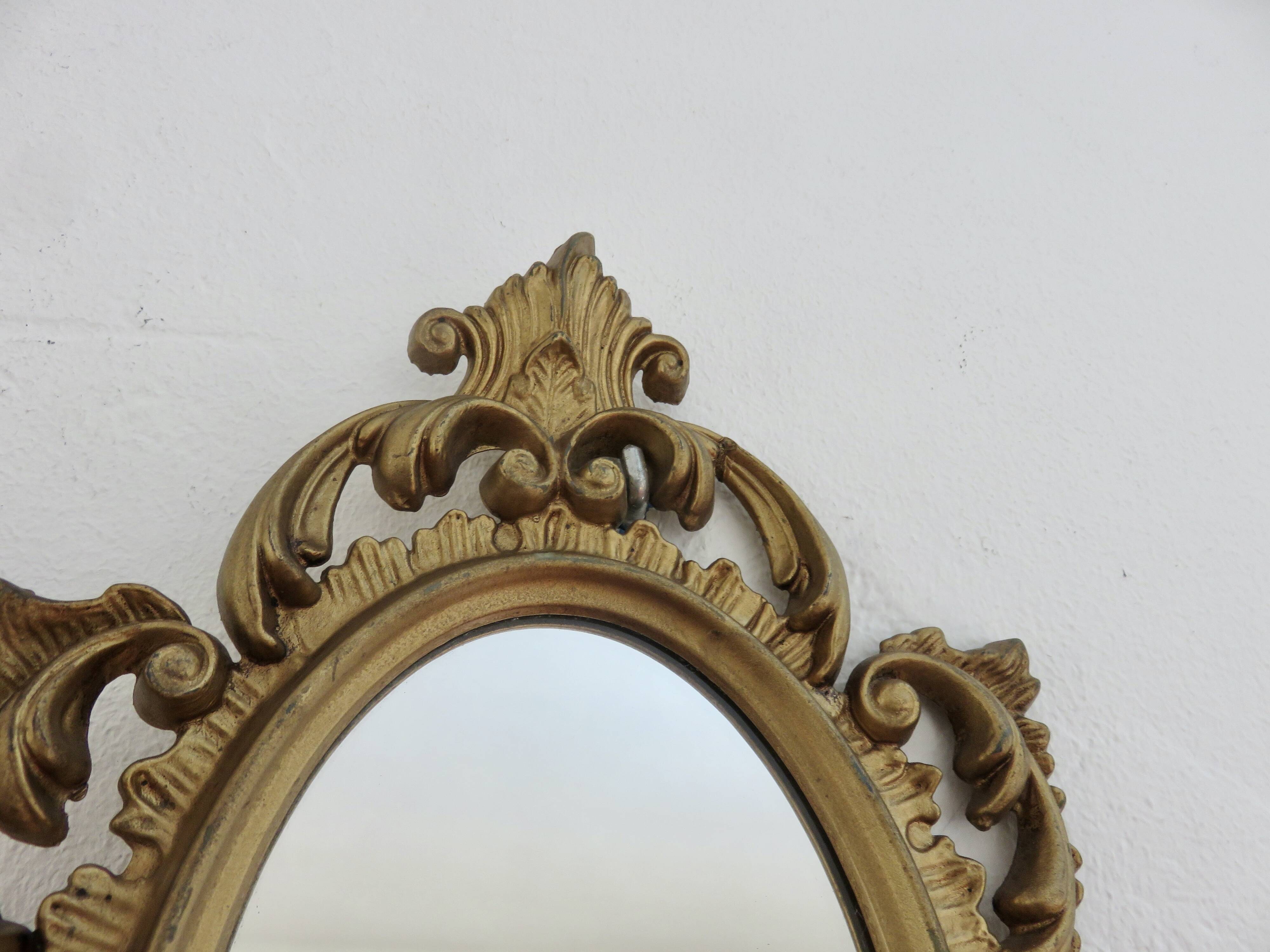 Small baroque mirror in gilded resin, made in Italy, 1970