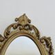 Small baroque mirror in gilded resin, made in Italy, 1970